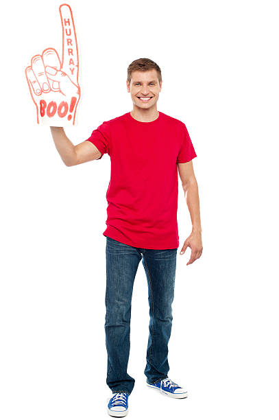 istock Casual guy showing large pointy boo hurray hand 484188729