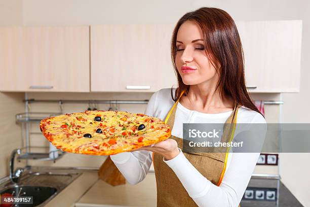 Happy Young Woman Cooking Pizza At Home Oven Stock Photo - Download Image Now - Adult, Chef, Cooking