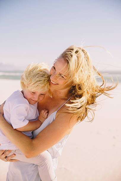 istock Mother and son cuddling 484190791