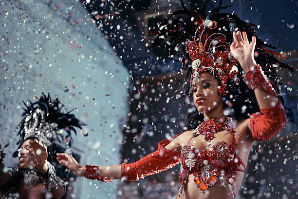 fiery festival dancers - samba dancing stock-fotos und bilder