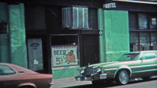 1971: Main street of town with five cent beer at local bar.