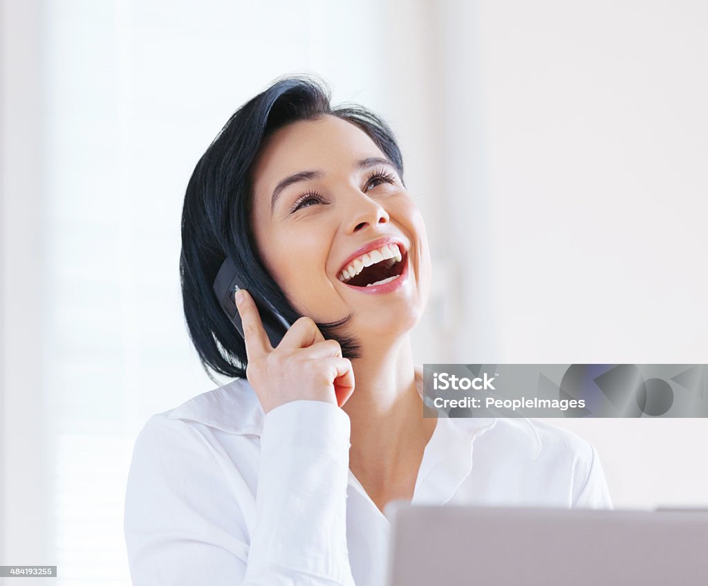 Some clients make the funniest calls Cropped shot of an attractive young woman wearing a headset while using her laptophttp://195.154.178.81/DATA/i_collage/pi/shoots/783131.jpg 20-29 Years Stock Photo