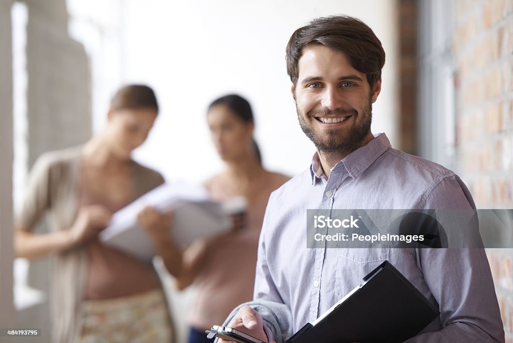 He'll lead his team to success Shot of  three young colleagues in their office building 20-29 Years Stock Photo