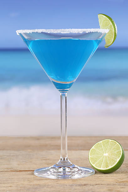 istock Blue Curacao cocktail on the beach 484194791