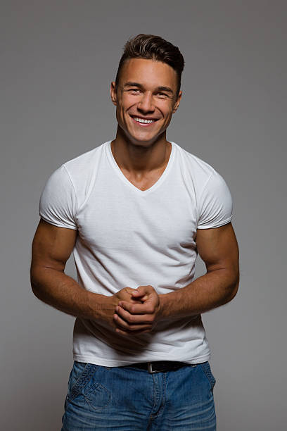 istock Smiling Handsome Man In White Shirt 484200068