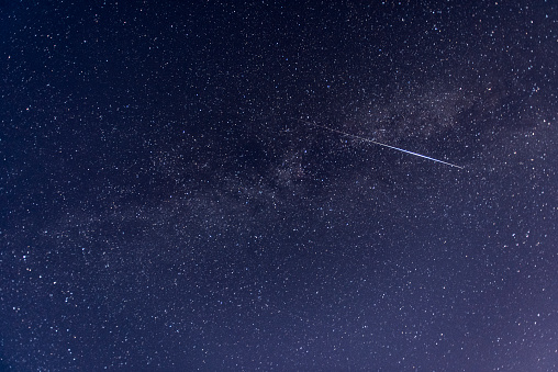 Perseid meteor crossing the sky, taken in the UK August 2015, Image contains grain due to the high ISO and long exposure required for this type of photography.