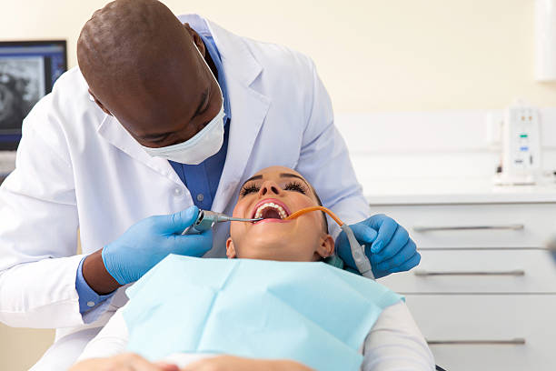 istock patient having her teeth cleaned by the hygienist 484204284