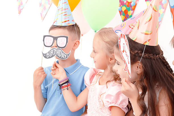 istock Children holding little birthday tags 484204492