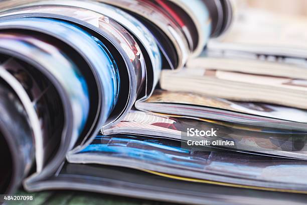 Stack Of Open Colorful Magazines Information Stock Photo - Download Image Now - Printmaking Technique, Magazine - Publication, Catalog