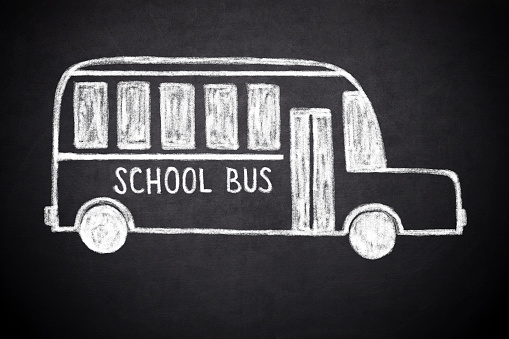 school bus drawn on blackboard