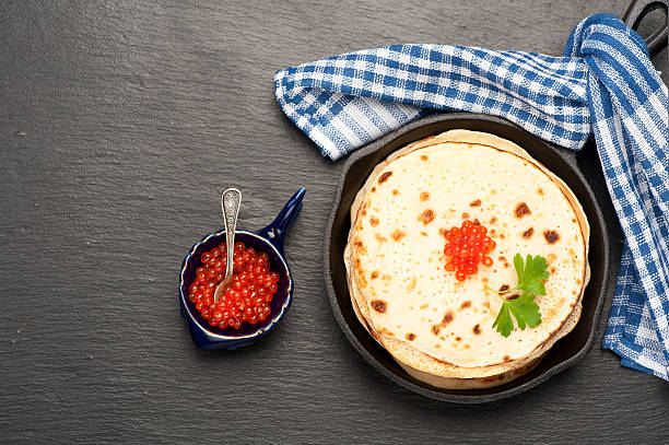 istock Pancakes with red caviar. top view 484222490