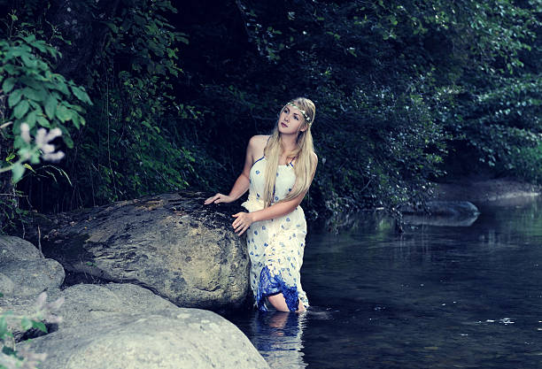 istock beautiful girl in the river 484224756
