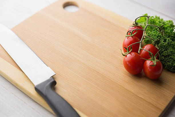 istock Chopping board tomatoes and parsley 484226042