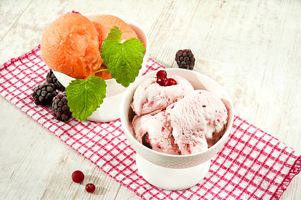 istock Multicolored fruit  ice cream with berries in porcelain bowls 484227463