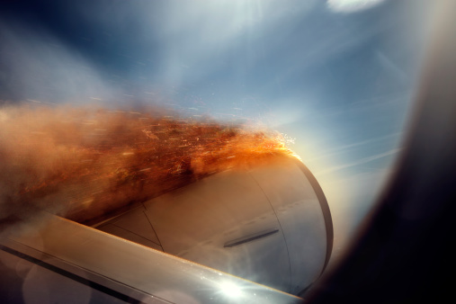 Airplane engine in fire from inside the plane