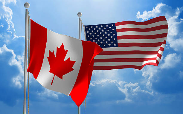 istock Canada and United States flags flying together for diplomatic talks 484229956