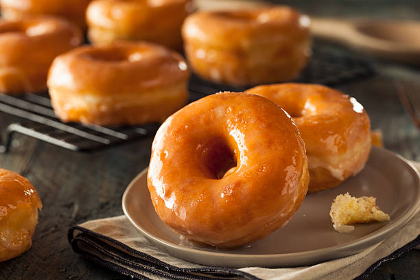 istock Homemade Round Glazed Donuts 484231070