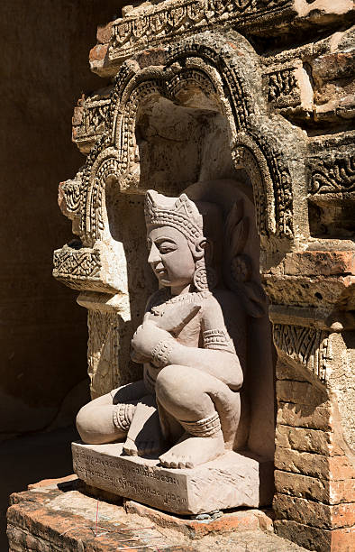 istock Kneeling statue at Htilominlo Pagoda 484234692