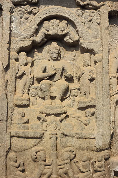 istock Ancient Buddha sculpture in Buddhist Karla caves in India 484234938