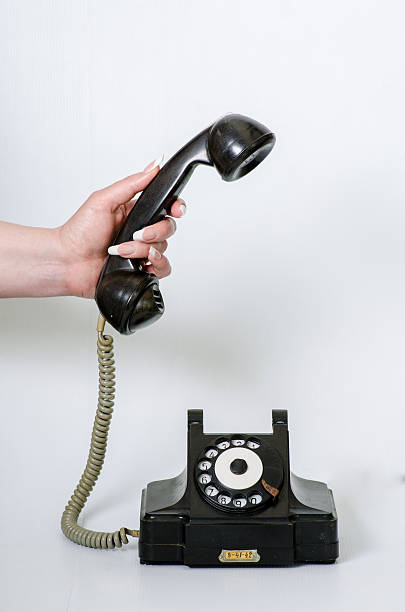 istock old black vintage phone isolated 484244560