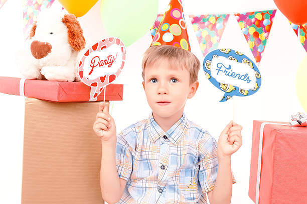 istock Little birthday boy during party 484259188