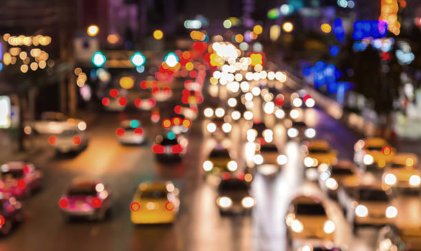 istock abstact blur bokeh of Evening traffic jam on road. 484261524