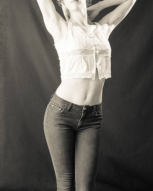 istock Slender Curvy Female Torso In Jeans 484261706