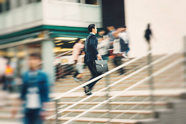 istock Businessman running on the street 484261746