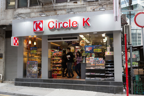 Hong Kong, Hong Kong SAR - April 10, 2014: People at the Circle K convenience stores located in Central District, Hong Kong. It is a international chain of convenience stores.