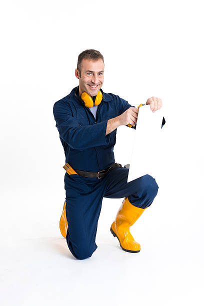 Portrait of an handsome Worker using a cutter