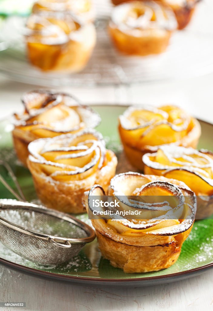 Apple roses. Apple roses. Cakes Apple Roses made from puff pastry with apple and cinnamon. 2015 Stock Photo