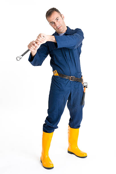 istock Portrait of an handsome Worker using a wrench 484264471