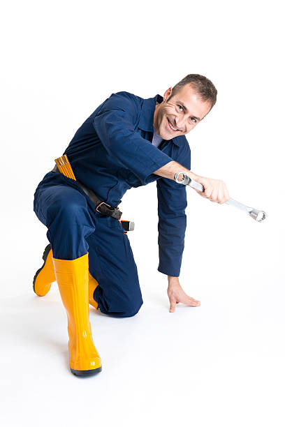 istock Portrait of an handsome Worker using a wrench 484264481