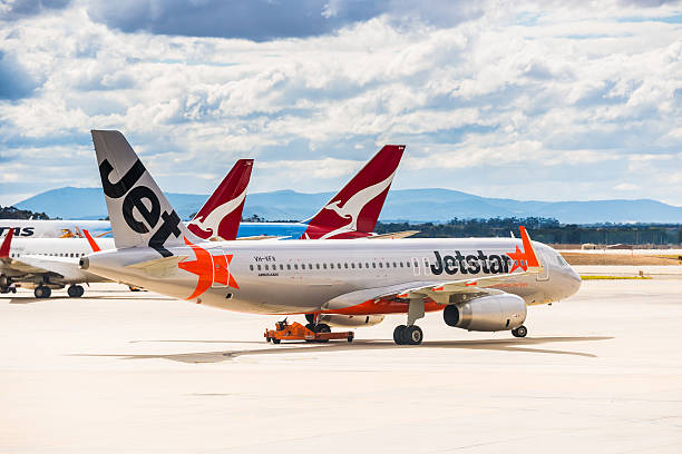 Jetstar and Qantas airliner at Melbourne Airport stock photo