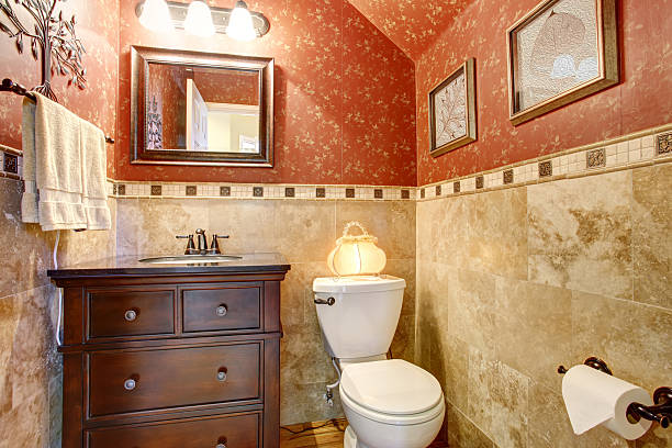 istock Well decorated half bathroom with red gold interior. 484265028