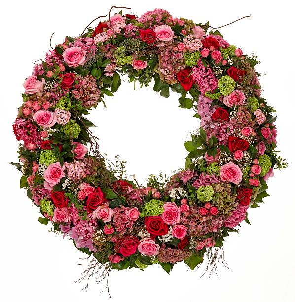 Round wreath made from yellow limonium caspia flowers on white background with copy space
