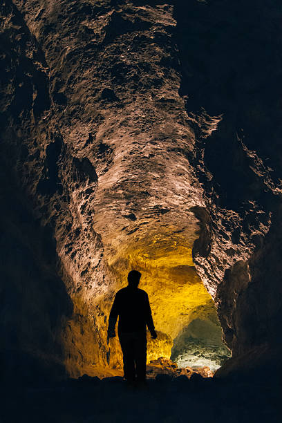 istock Silhouette of a cave man 484266406