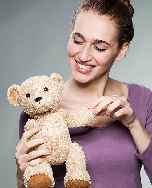 istock beautiful 20s girl holding her favorite comforter with fun 484267352
