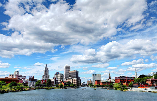 Providence, Rhode Island Downtown Providence, Rhode Island skyline along the banks of the Providence River. Providence is the capital and most populous city in Rhode Island.  providence rhode island stock pictures, royalty-free photos & images