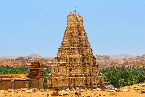 Photo of the landmark Virupaksha Temple also known as Pampapathi Temple in Hampi, Karnataka state, southern India. It is part of the Group of Monuments at Hampi, designated a UNESCO World Heritage Site.