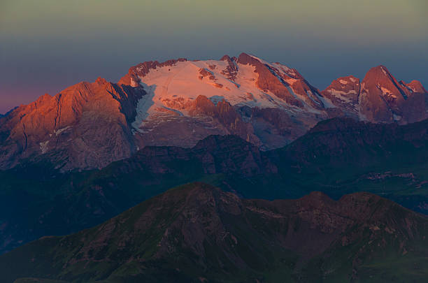 istock Sunrise in Dolomites - first sunrays on Marmolada mountain 484273848