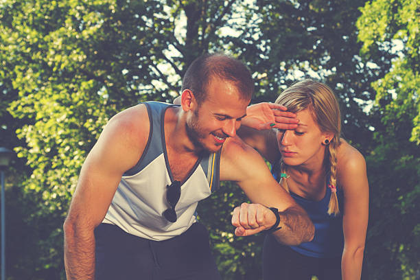 istock Couple doing some exercise/running/jogging in the park. 484276240