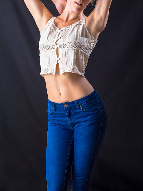 istock Slender Curvy Female Torso In Jeans 484278248