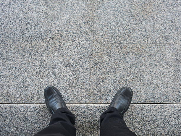 istock Business man look down to floor. 484279728