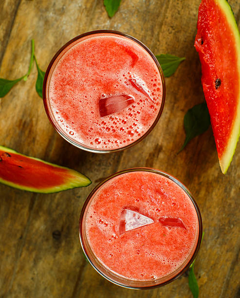 istock Watermelon juice on a wooden table 484279770