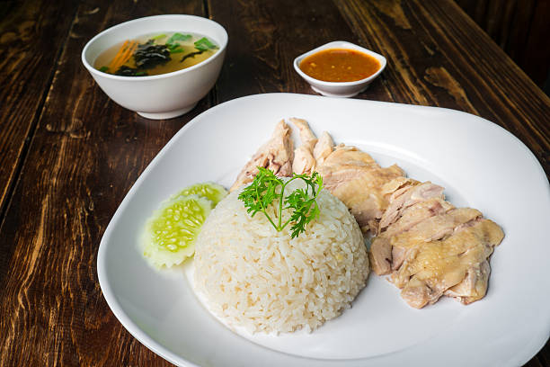 istock hainanese boiled chicken rice on the wooden table 484280714