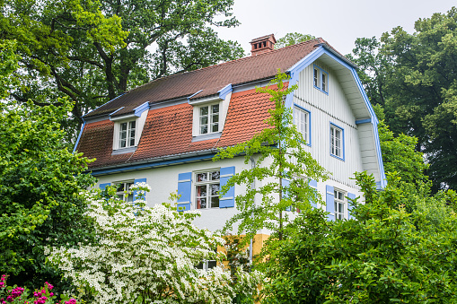 Murnau, Germany - June 16, 2015: The Muenter House in Murnau, Germany on June 16, 2015. The former home of the famous painter Gabriele Muenter (1877-1962) which now hosts a museum. Foto taken from Kottmuellerallee.