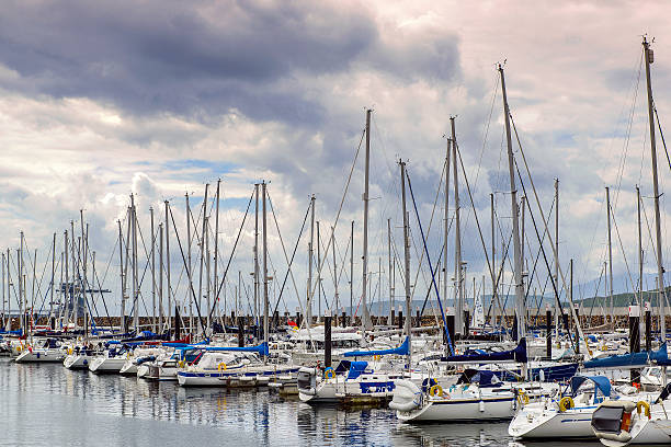 istock Yachts docked in marina bay 484285970