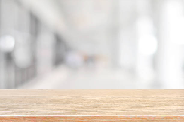istock Wood table top on blurred hallway background 484286288
