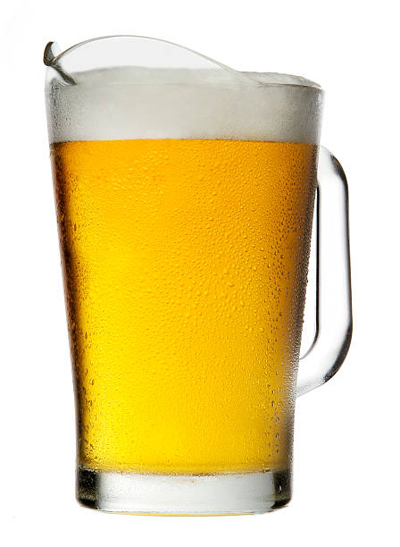Pitcher of Beer with Foam Pitcher of Beer with Foam isolated on white background jug photos stock pictures, royalty-free photos & images